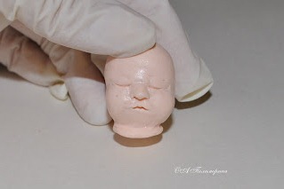 Младенец из полимерной глины
