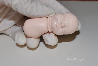Младенец из полимерной глины